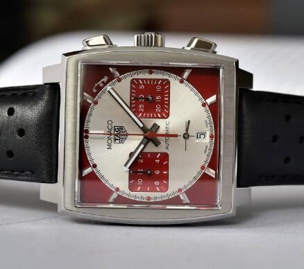 The red second hand and sub-dials are striking on the silver dial.
